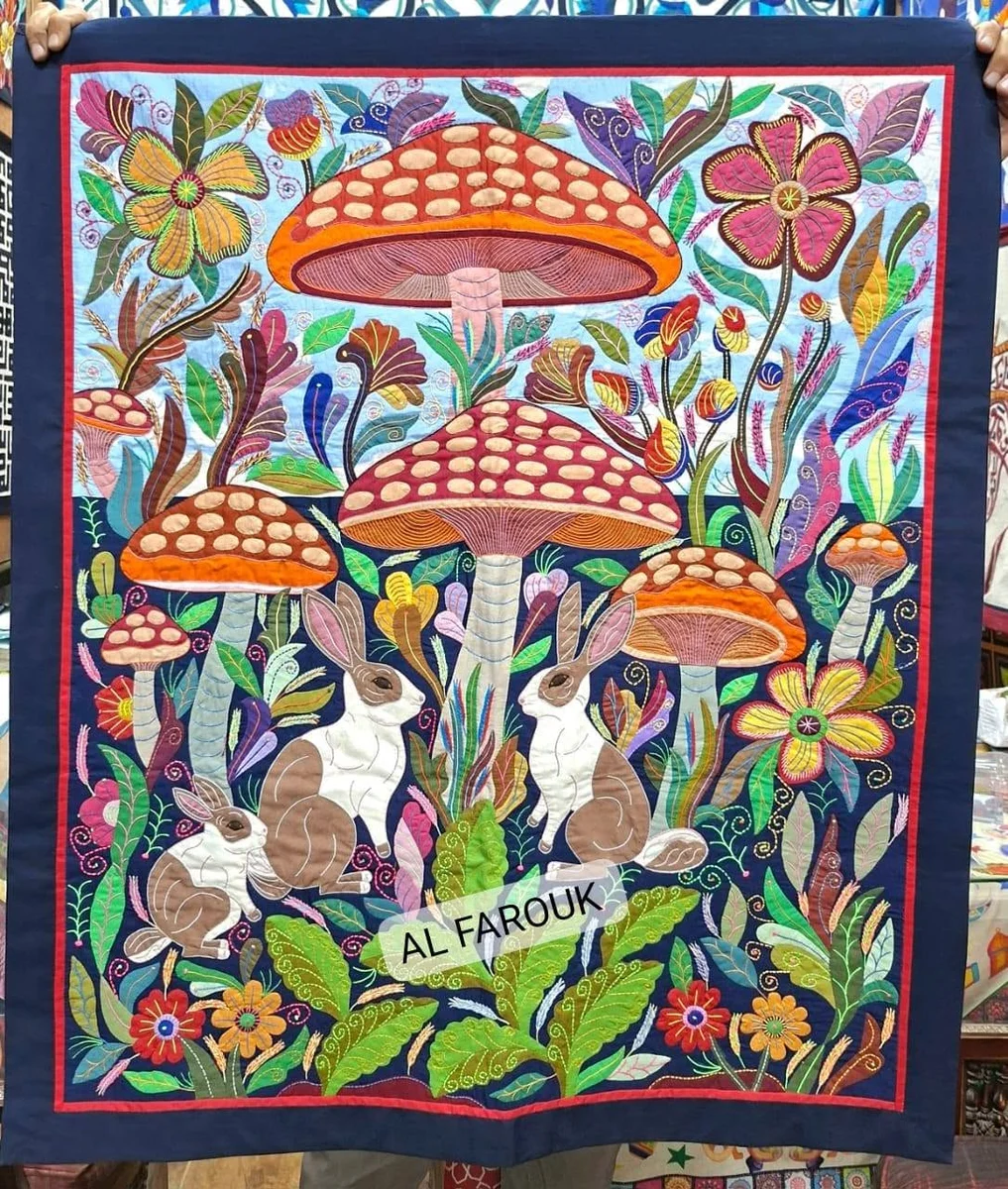 Whimsical Khayamiya panel featuring rabbits beneath large mushrooms
