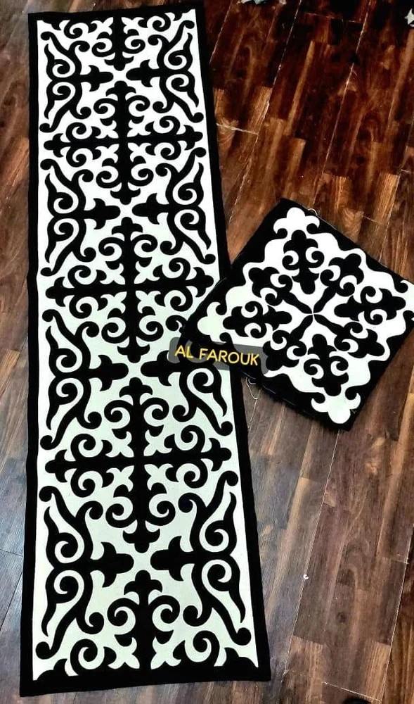 Black and white Khayamiya runner and cushion with striking repeating ornament